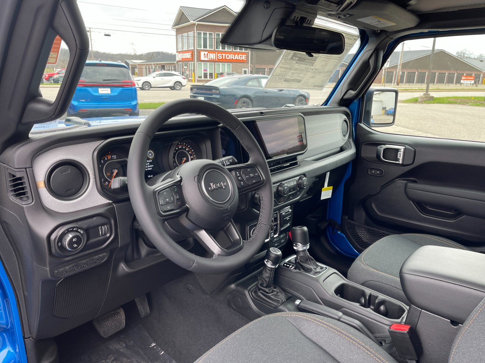 New 2026 Hydro Blue Pearlcoat Jeep Sport S image 10