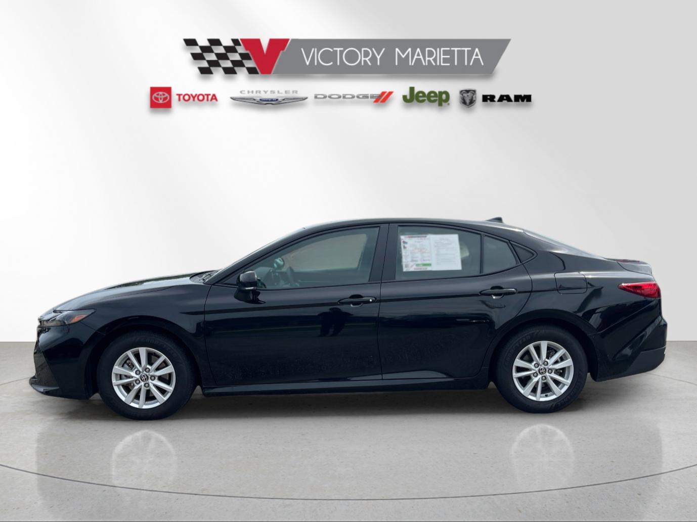 Used 2026 Midnight Black Metallic Toyota LE image 2