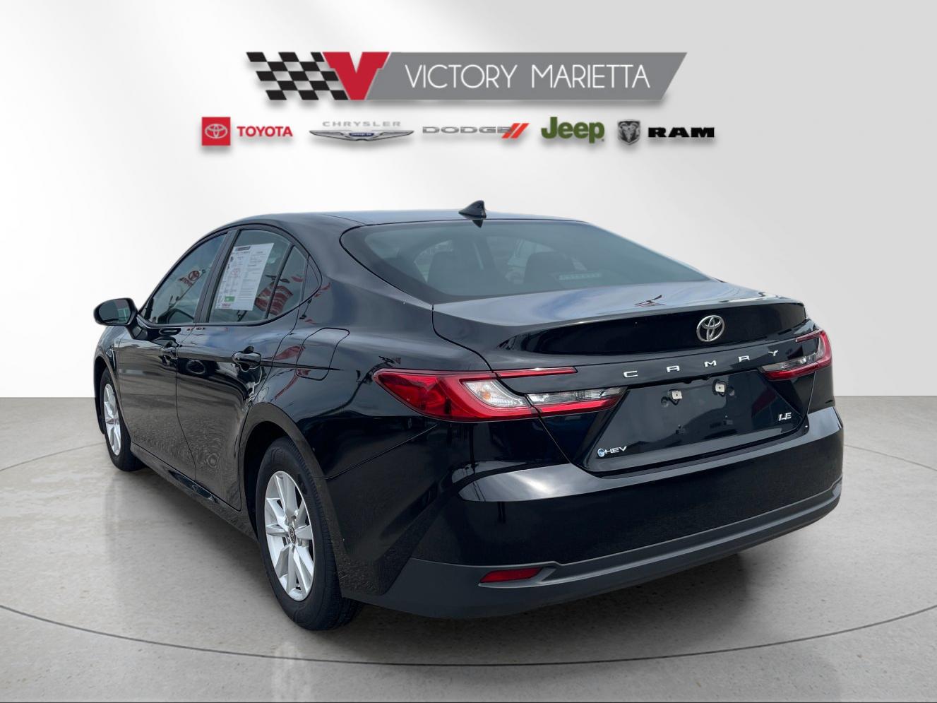 Used 2026 Midnight Black Metallic Toyota LE image 3