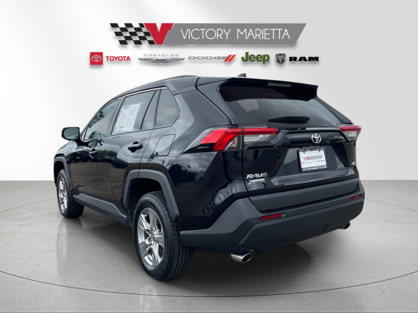 Used 2024 Midnight Black Metallic Toyota XLE image 3