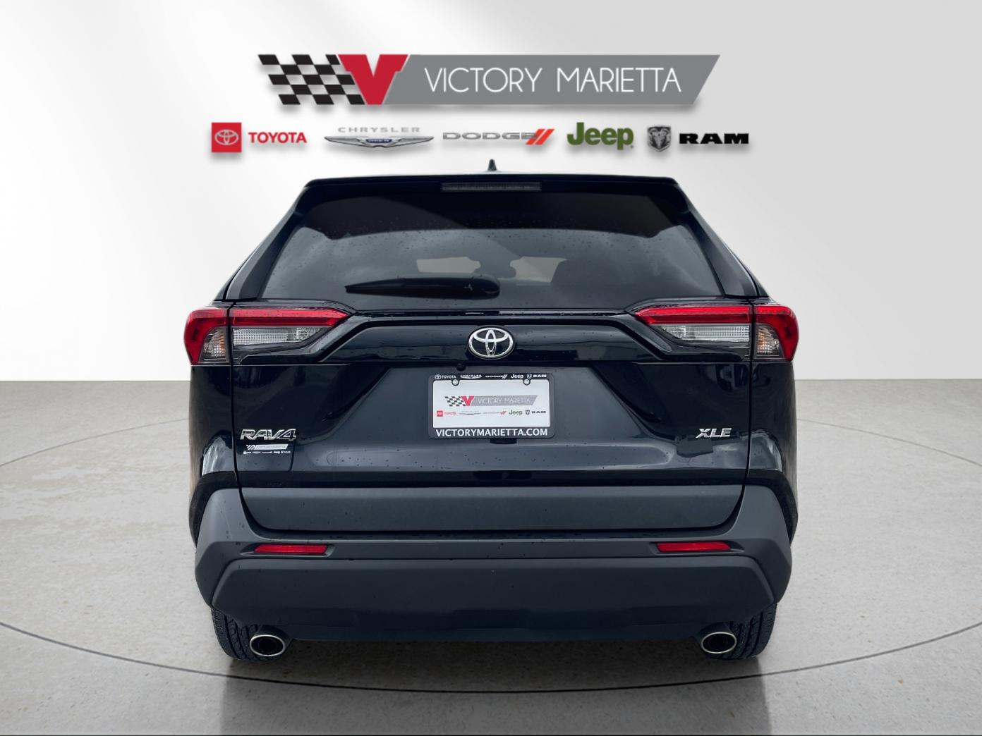 Used 2024 Midnight Black Metallic Toyota XLE image 4