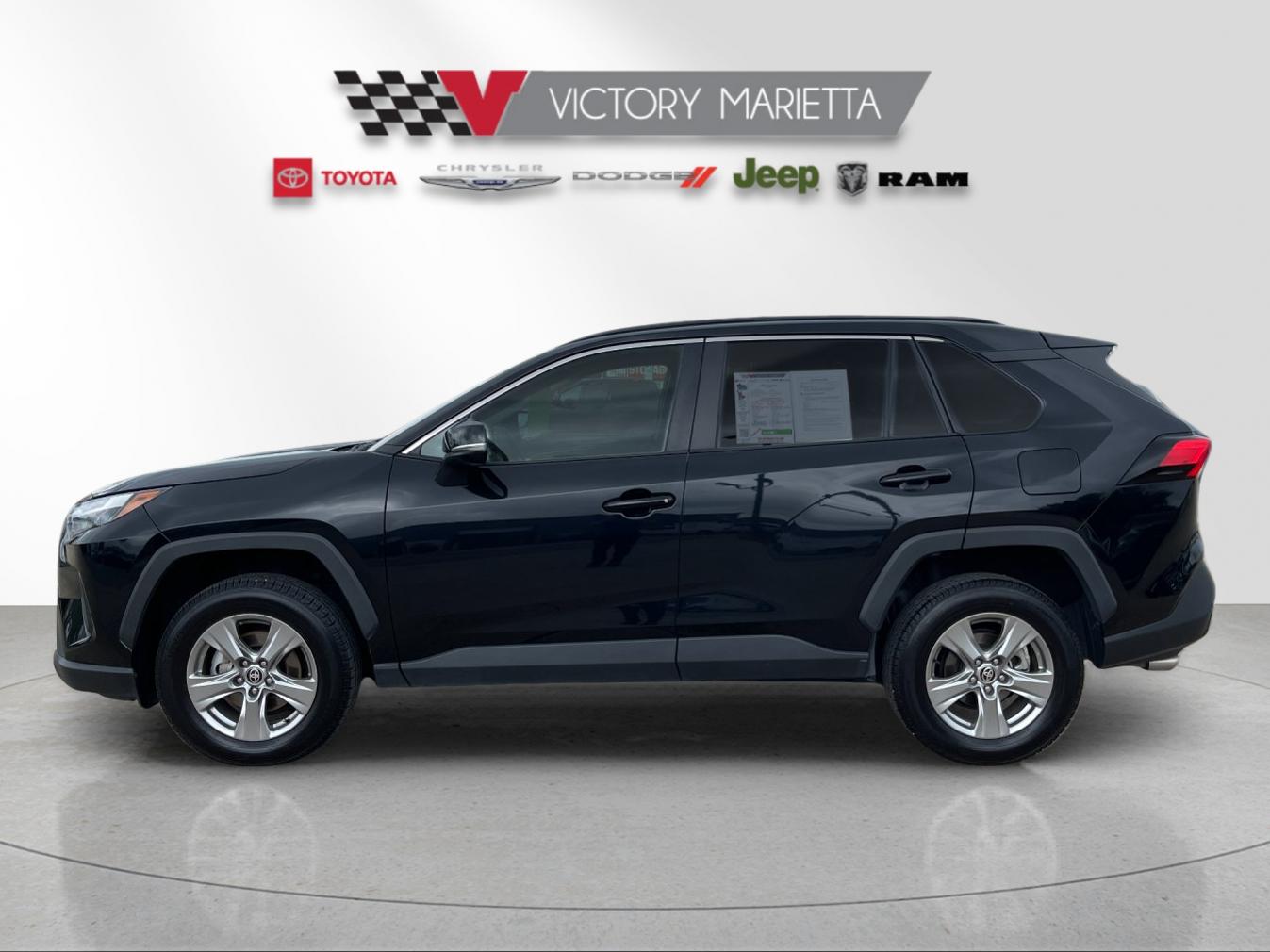 Used 2024 Midnight Black Metallic Toyota XLE image 2