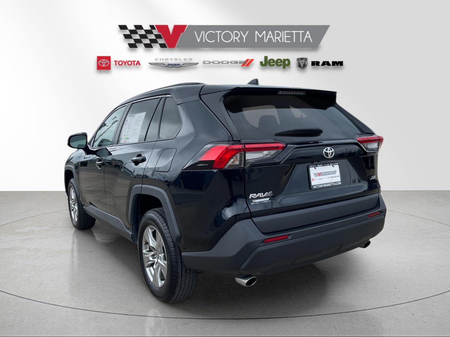 Used 2024 Midnight Black Metallic Toyota XLE image 3
