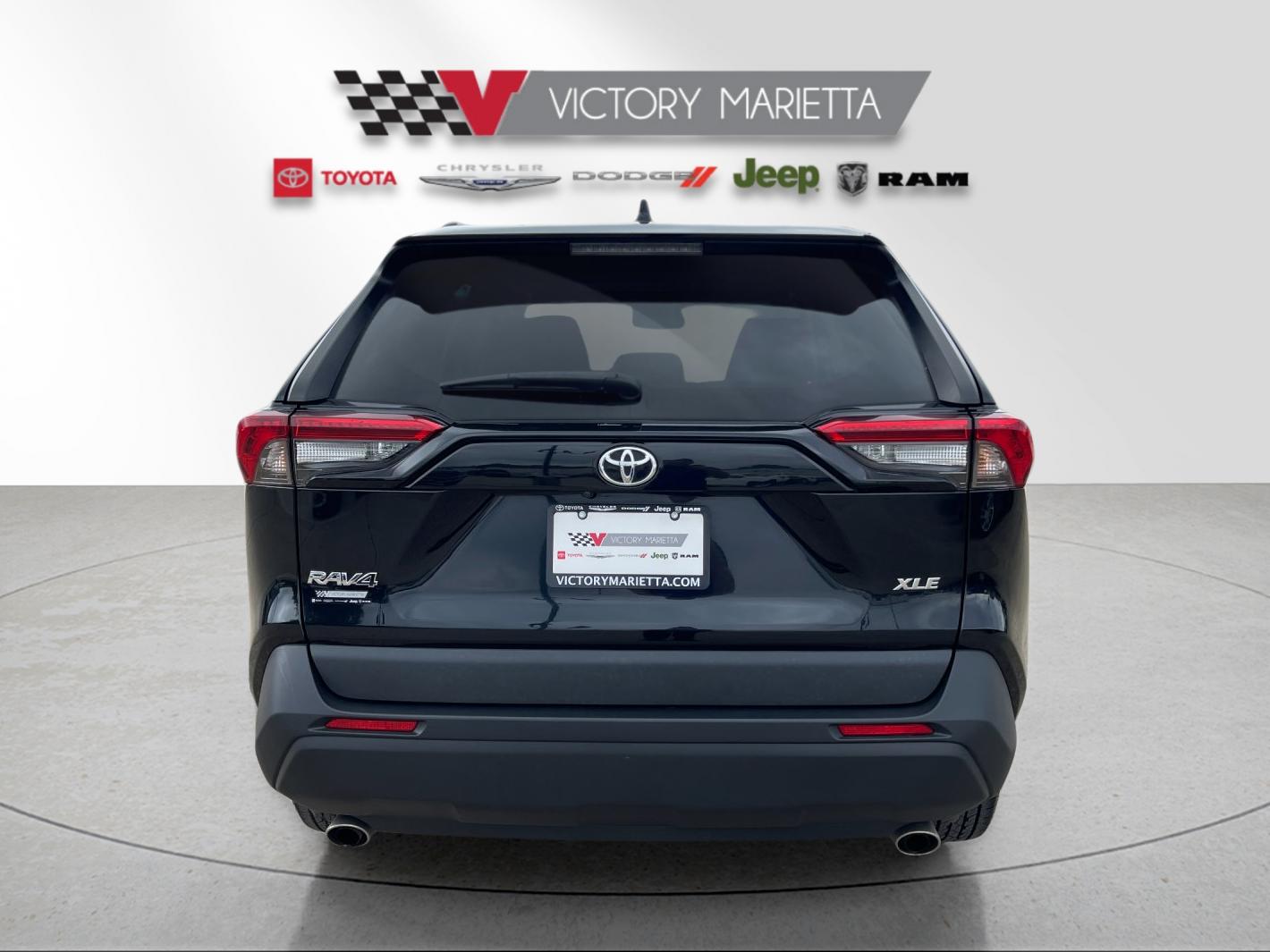 Used 2024 Midnight Black Metallic Toyota XLE image 4