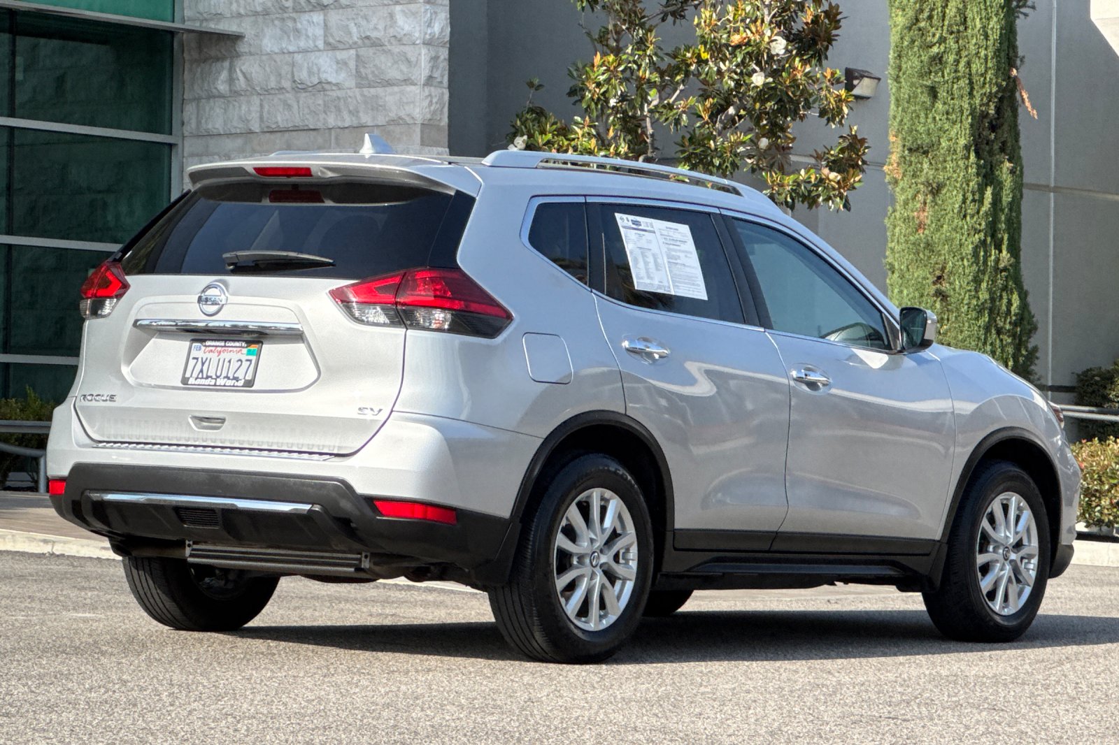 Used 2017 Brilliant Silver Nissan SV image 4