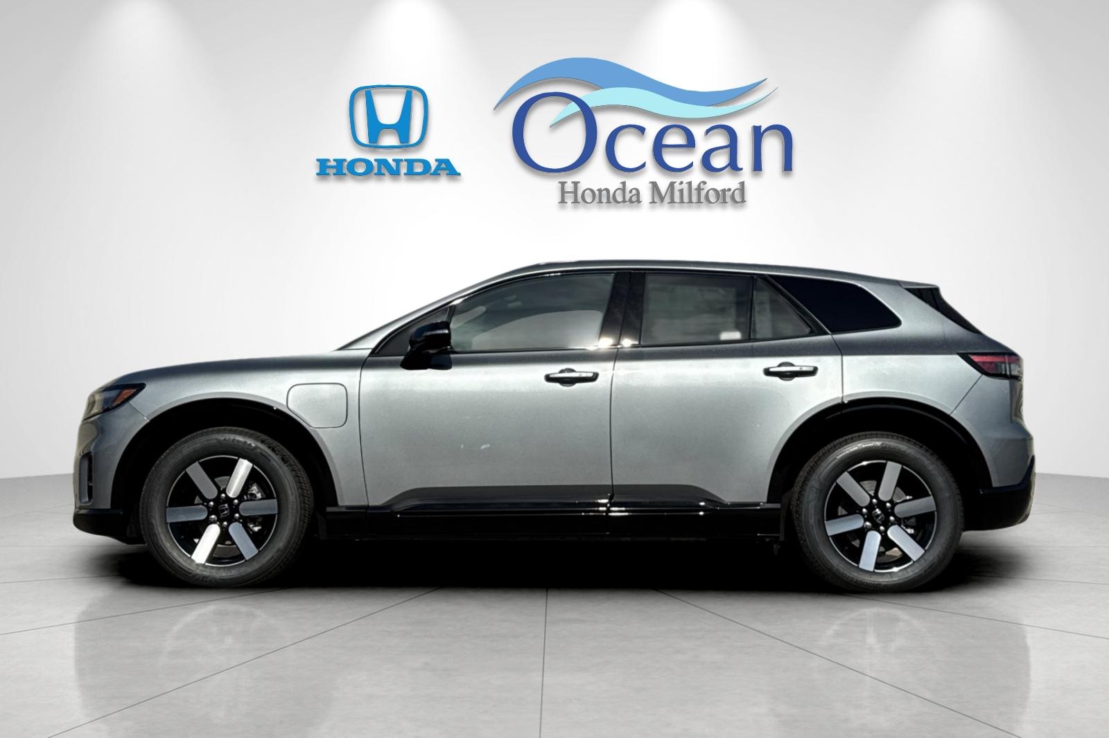 New 2026 Mercury Silver Metallic Honda AWD Touring image 2