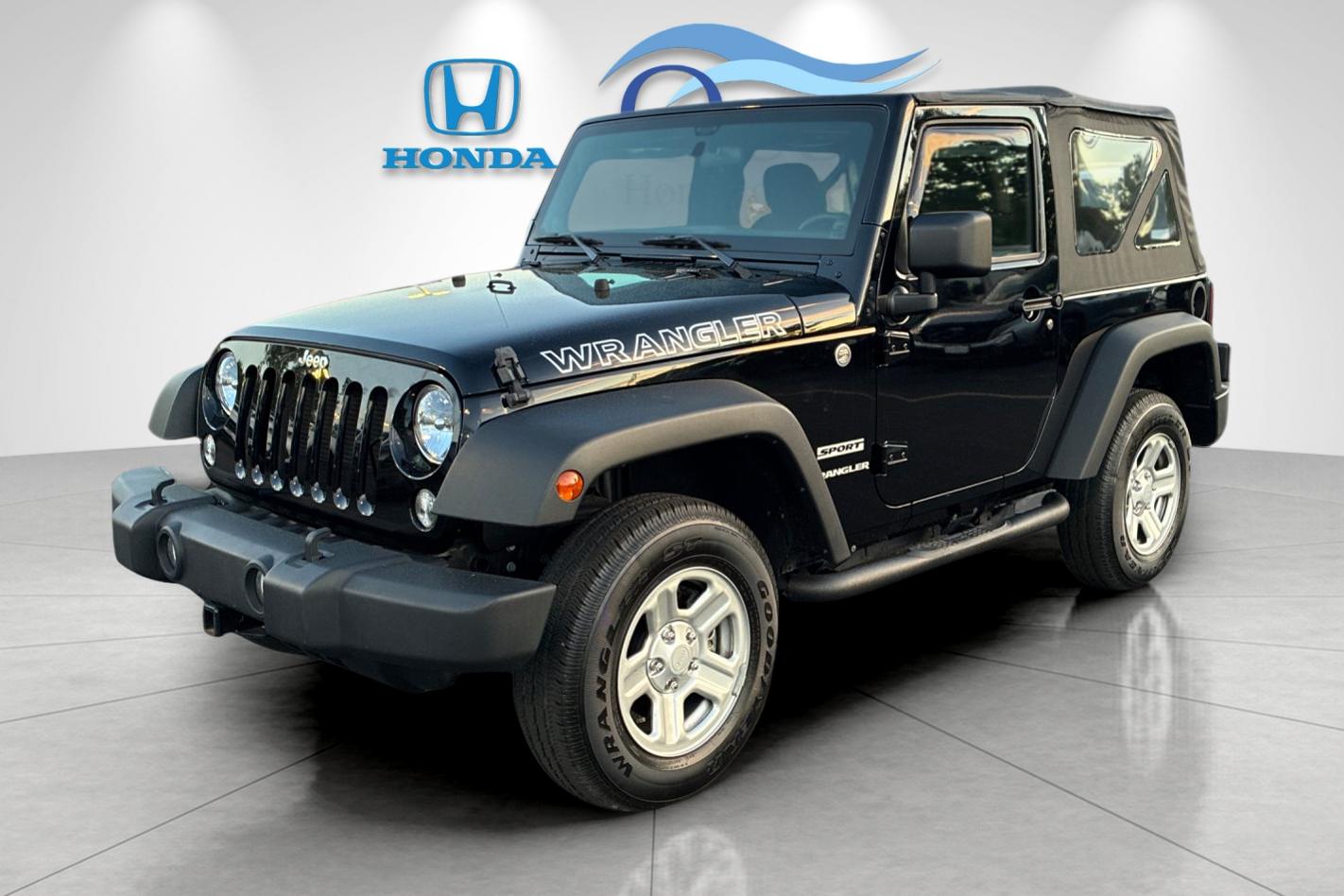 Used 2014 Black Clearcoat Jeep Sport image 7