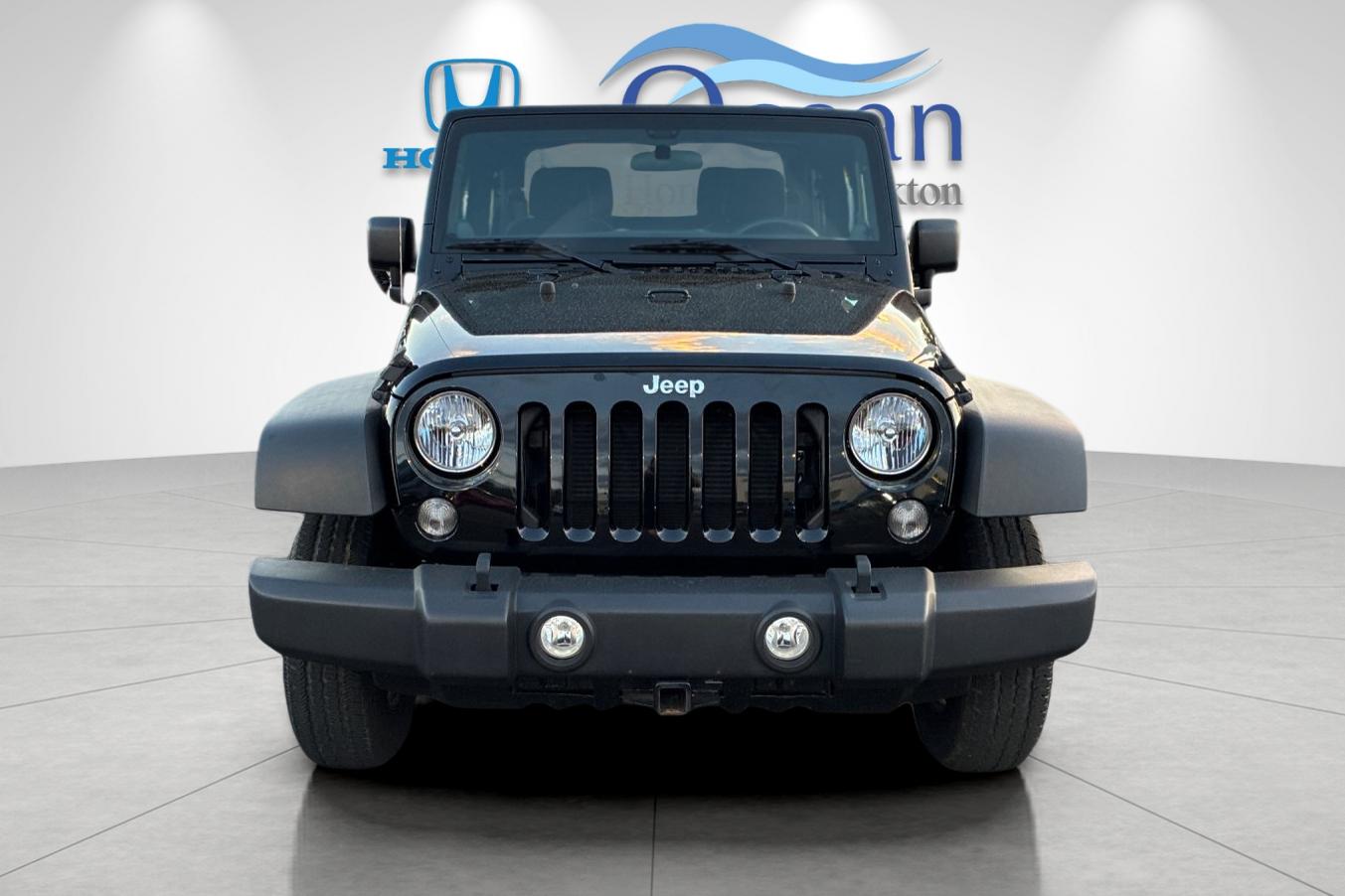 Used 2014 Black Clearcoat Jeep Sport image 8