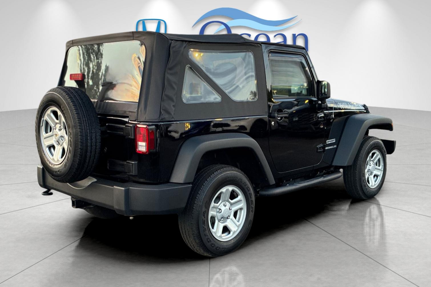 Used 2014 Black Clearcoat Jeep Sport image 3