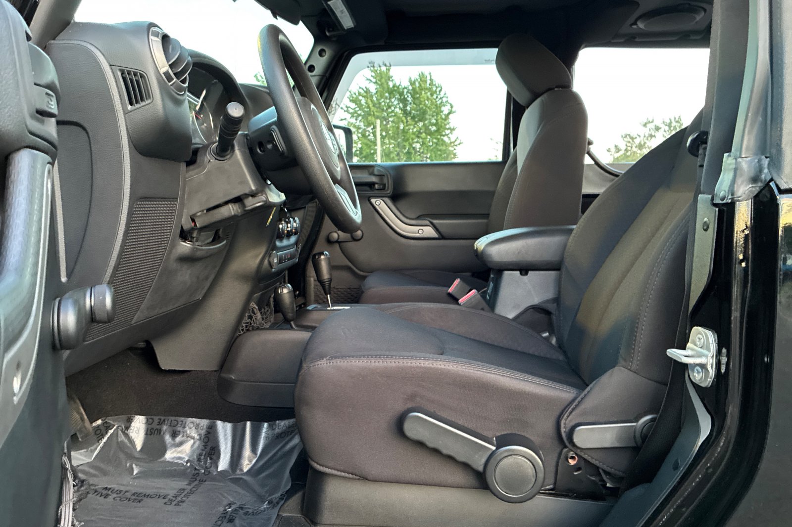 Used 2014 Black Clearcoat Jeep Sport image 9