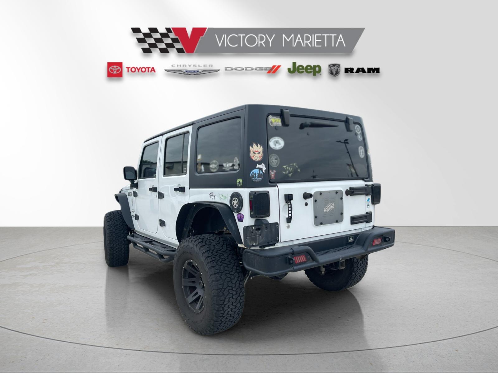 Used 2016 Bright White Clearcoat Jeep Unlimited Sahara image 3