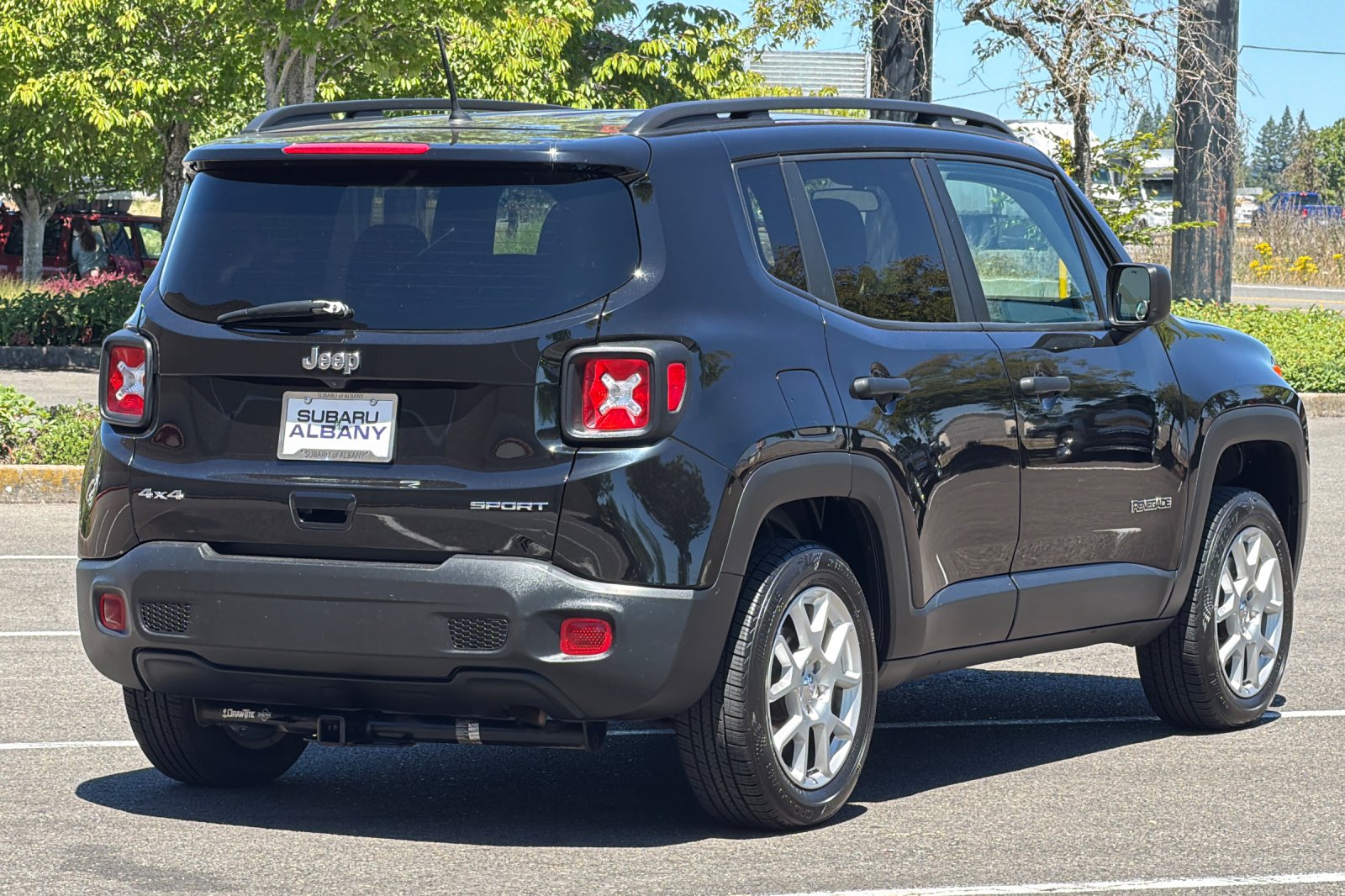 Used 2019 Black Clearcoat Jeep Sport image 4