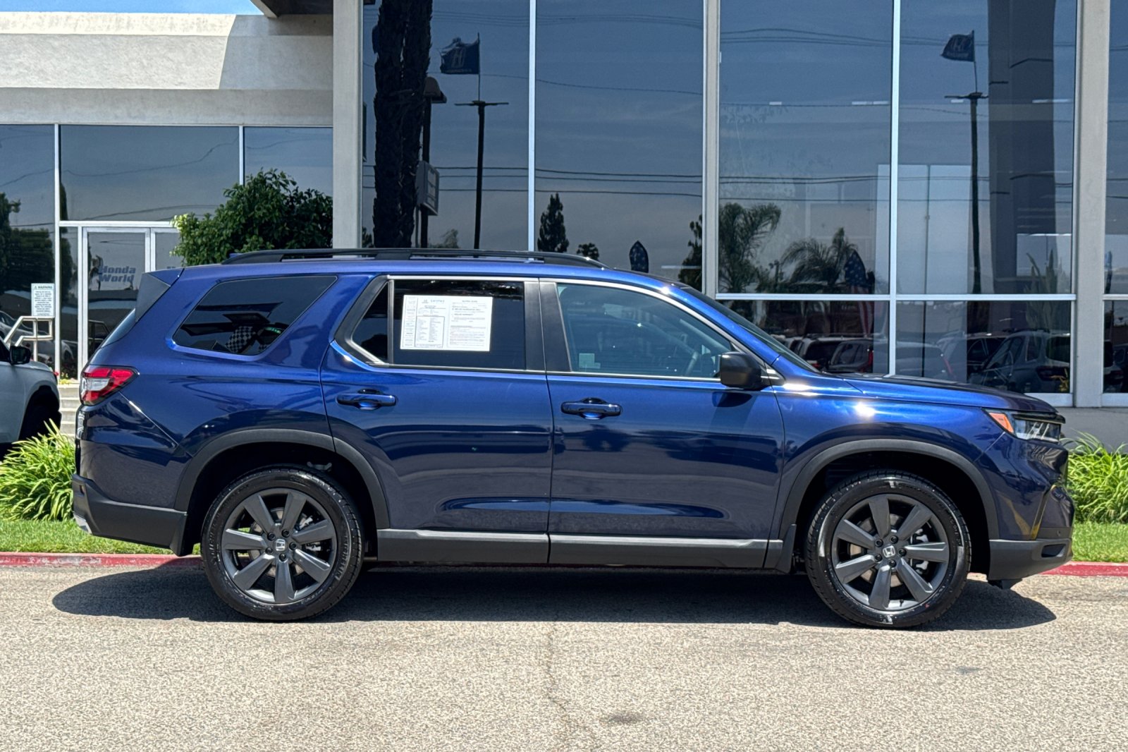 Certified Used 2025 Obsidian Blue Pearl Honda AWD Sport image 3