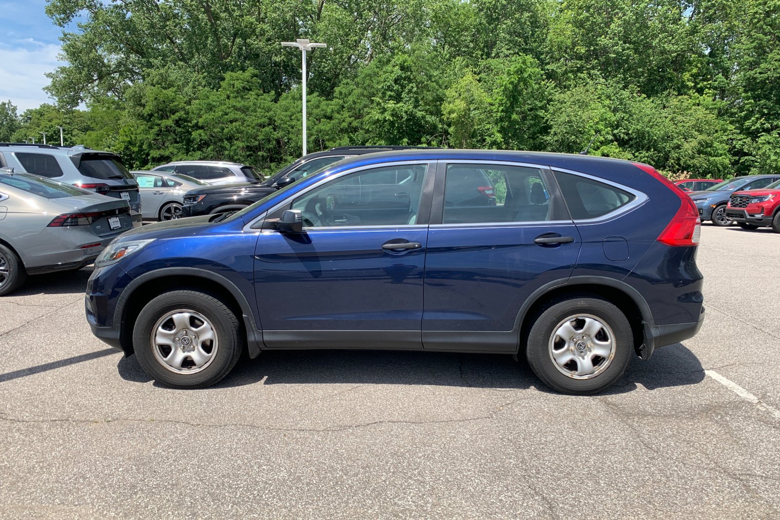 Used 2015 Honda CR-V LX with VIN 2HKRM4H39FH704369 for sale in Michigan City, IN