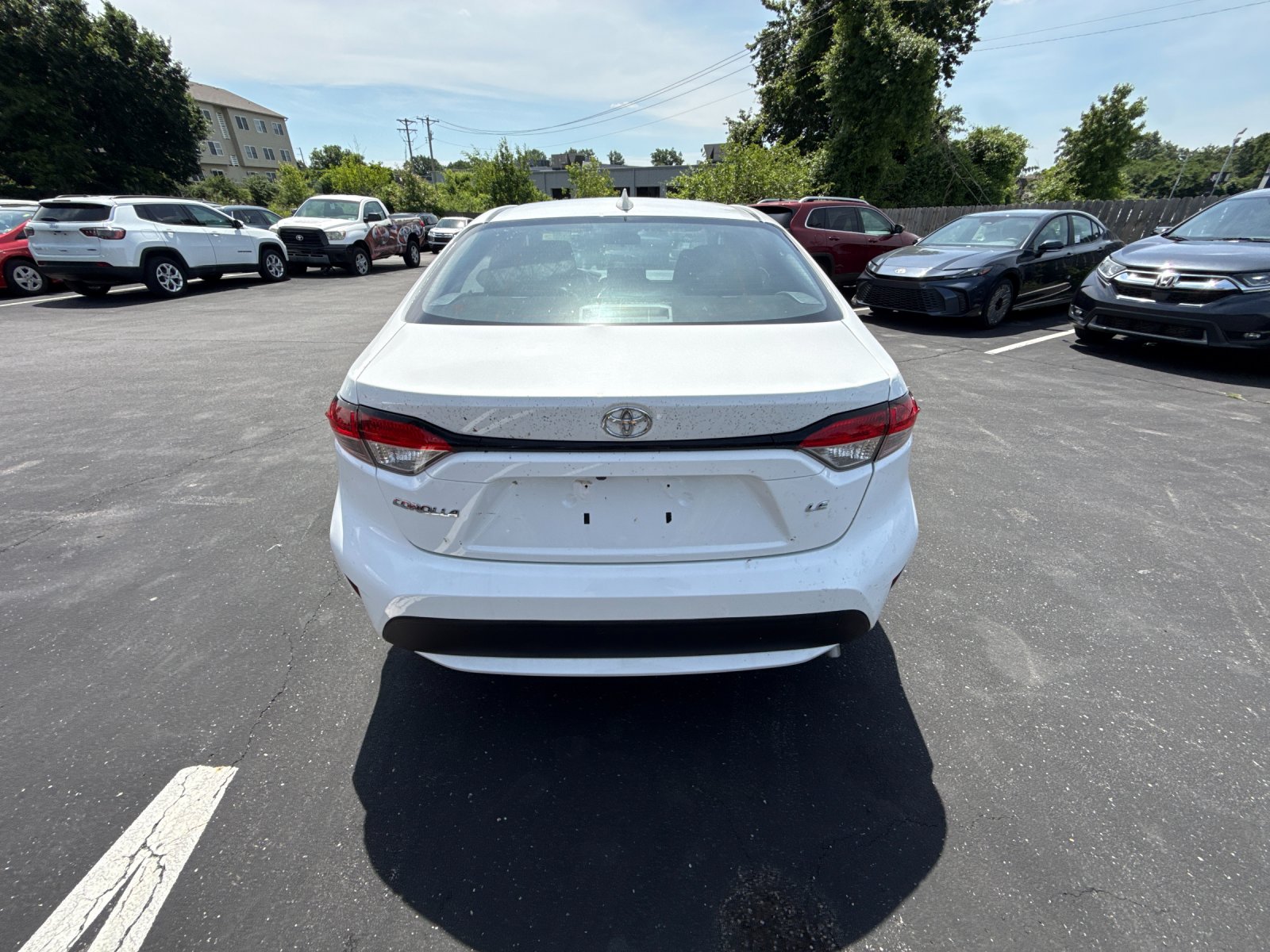 Used 2025 White Toyota LE image 2