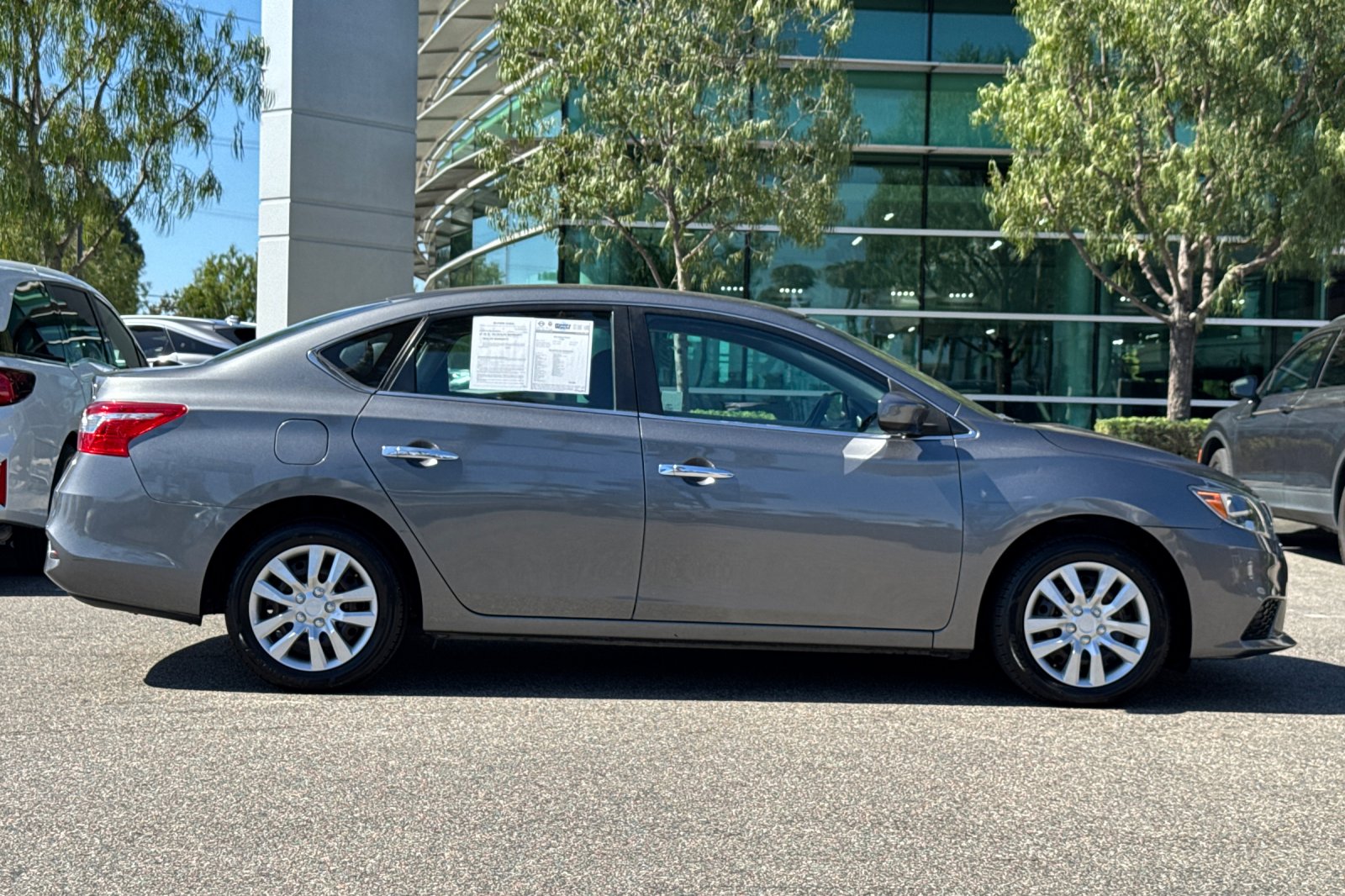 Used 2019 Gun Metallic Nissan S image 3