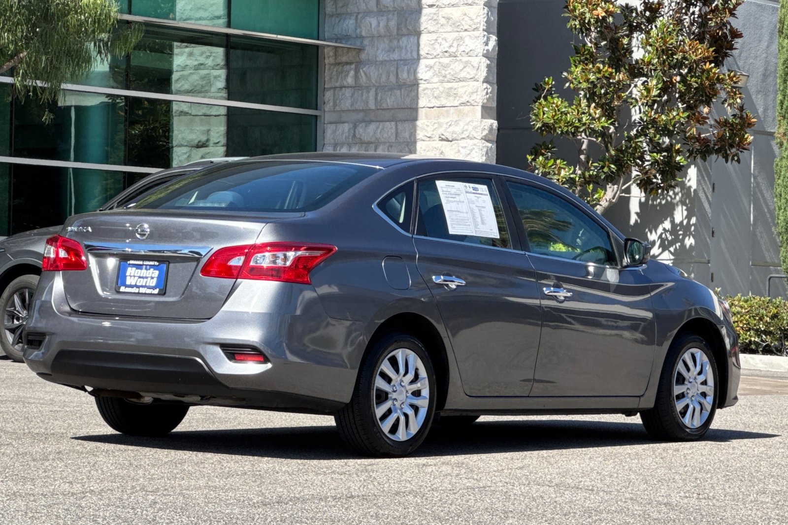 Used 2019 Gun Metallic Nissan S image 4