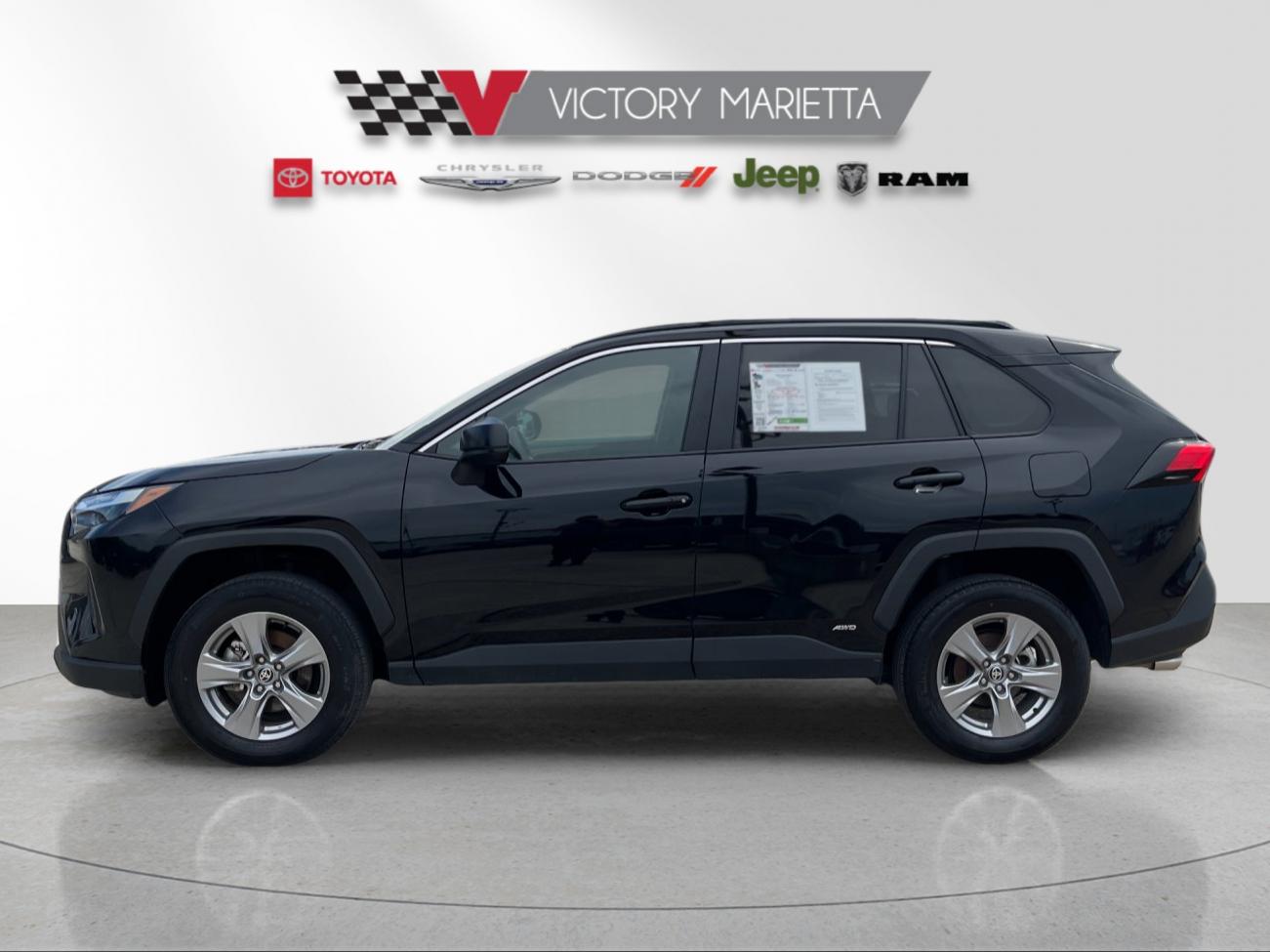 Used 2025 Midnight Black Metallic Toyota LE image 2