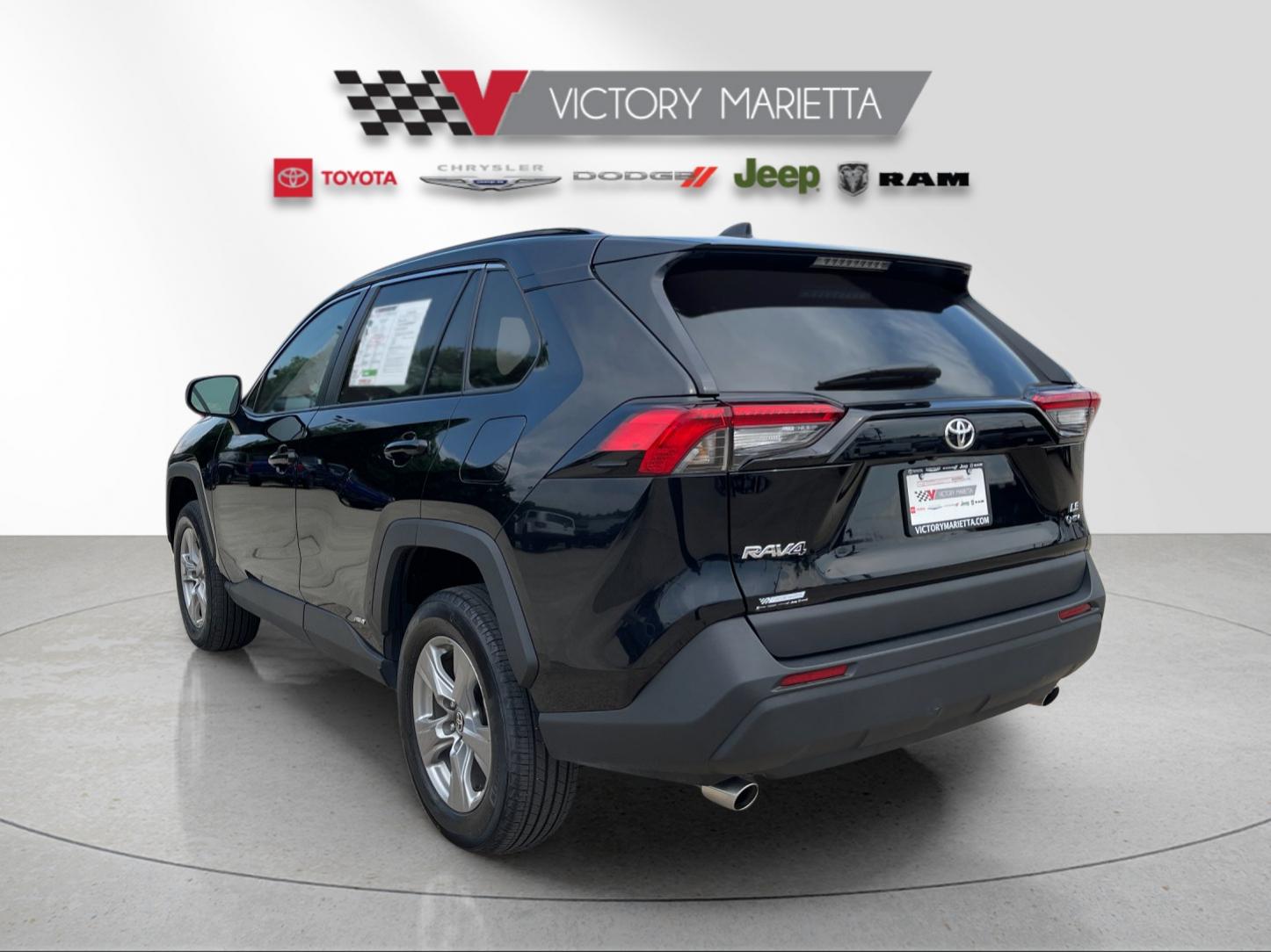 Used 2025 Midnight Black Metallic Toyota LE image 3