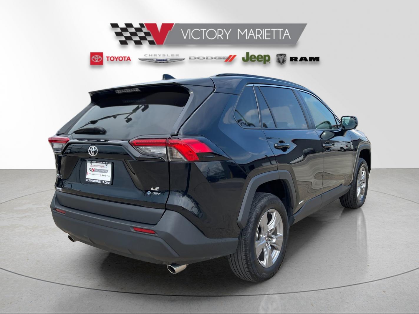 Used 2025 Midnight Black Metallic Toyota LE image 5