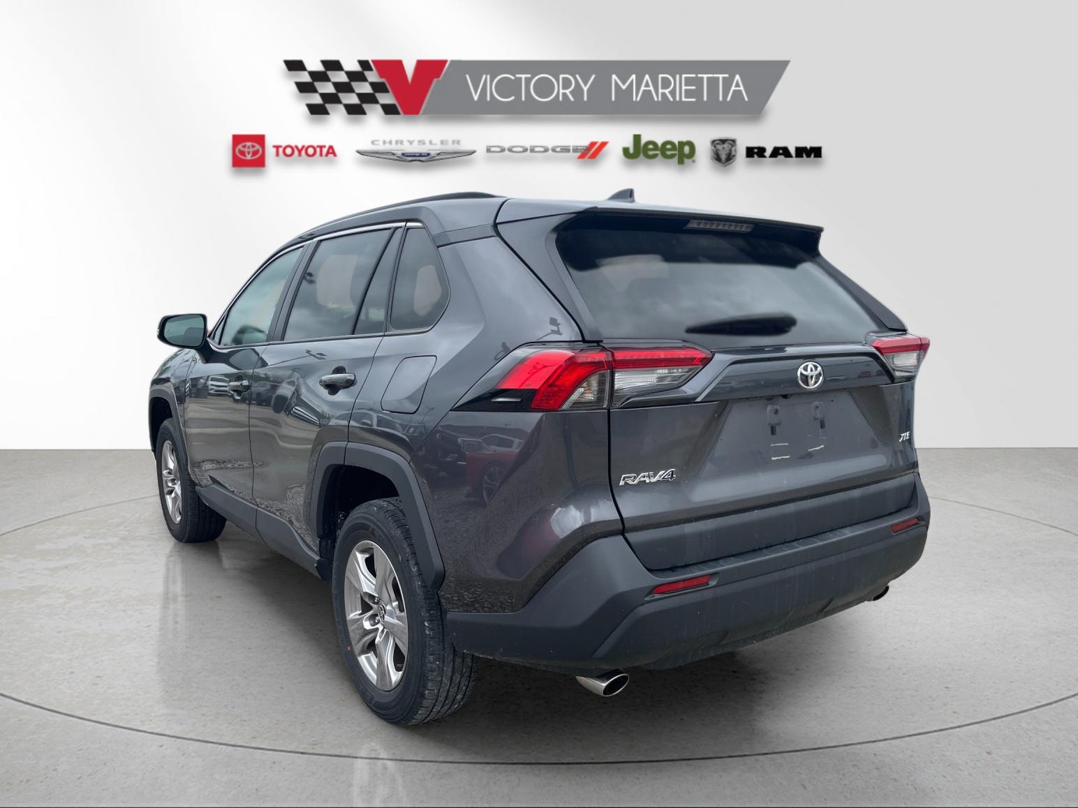 Used 2024 Magnetic Gray Metallic Toyota XLE image 3