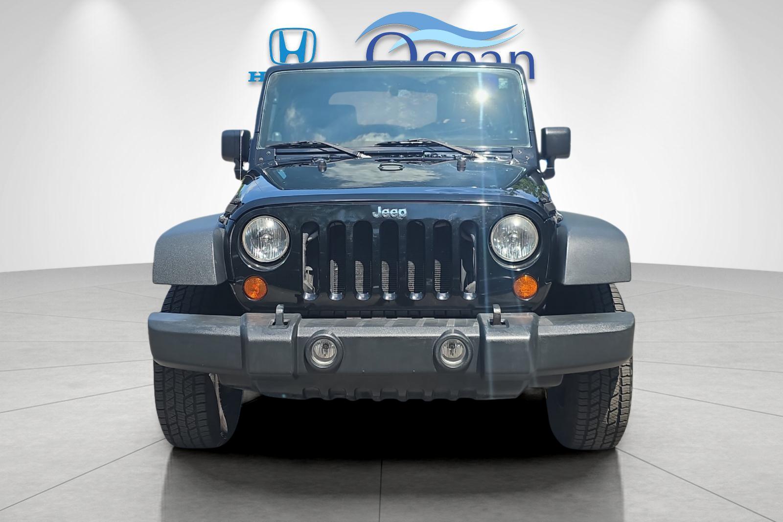 Used 2008 Black Clearcoat/Black Soft Top Jeep X image 8