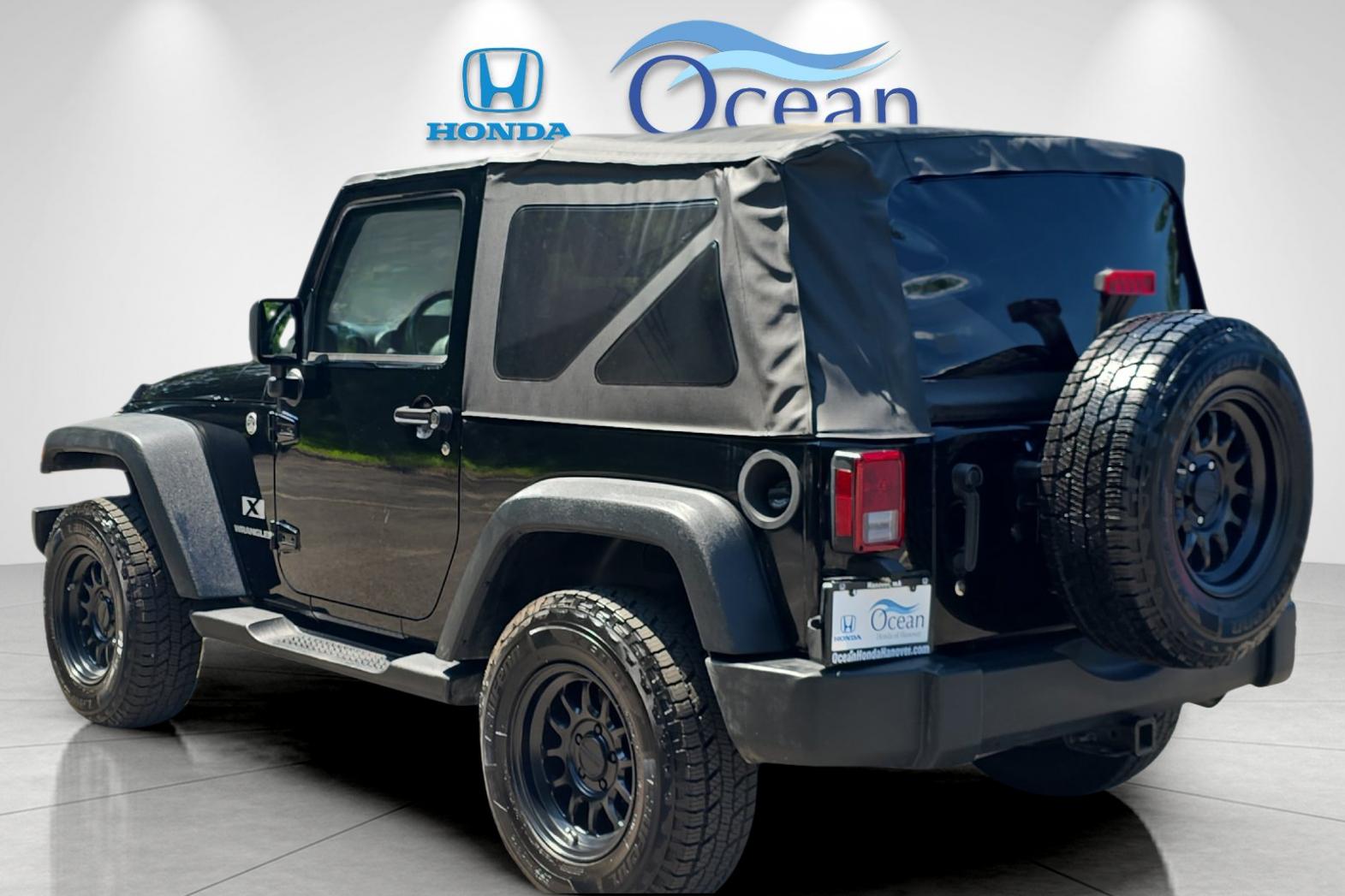 Used 2008 Black Clearcoat/Black Soft Top Jeep X image 5