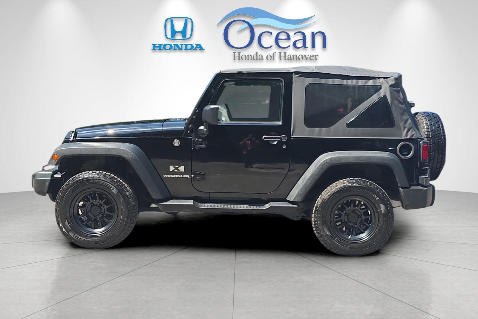 Used 2008 Black Clearcoat/Black Soft Top Jeep X image 6