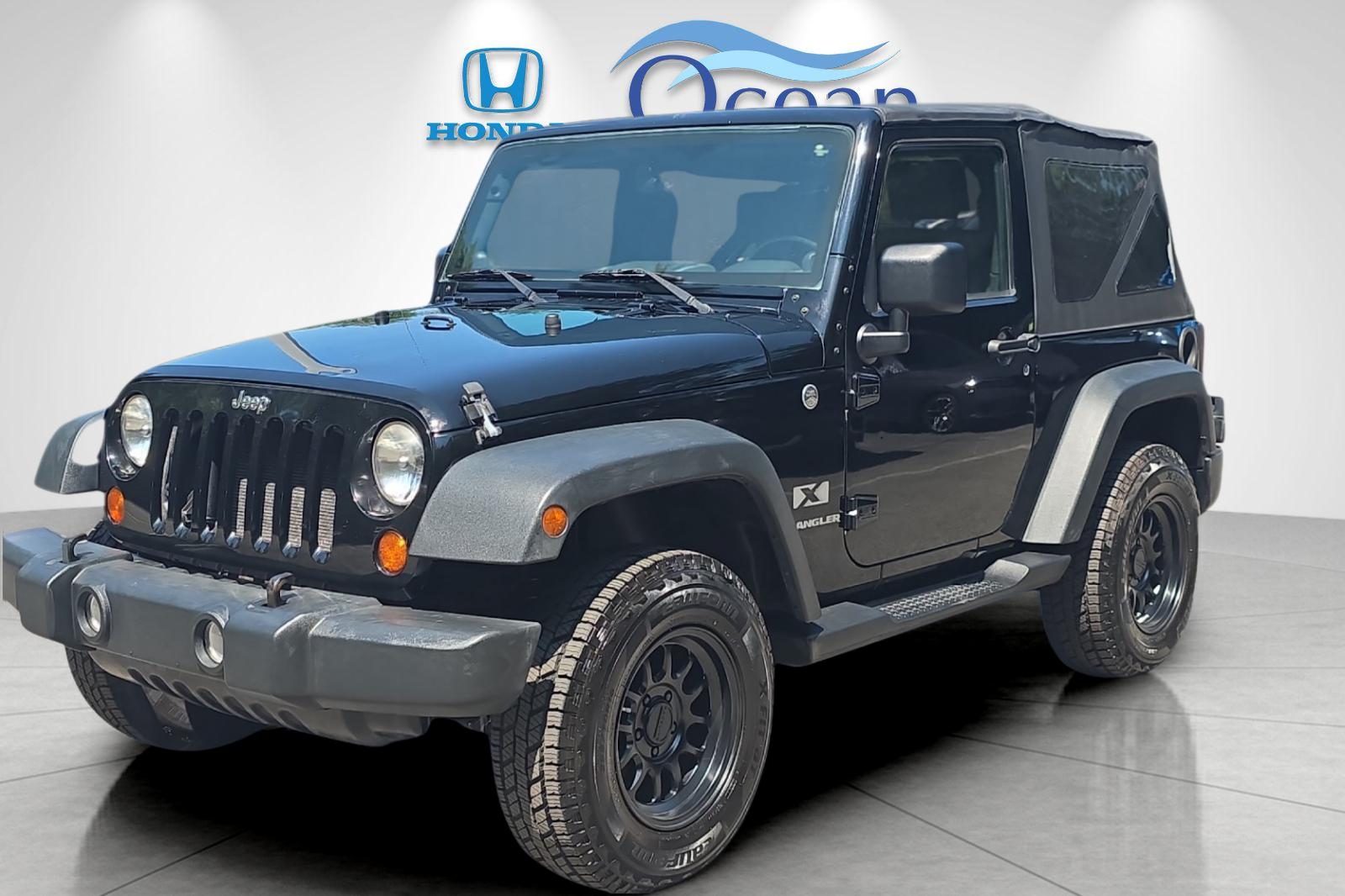Used 2008 Black Clearcoat/Black Soft Top Jeep X image 7