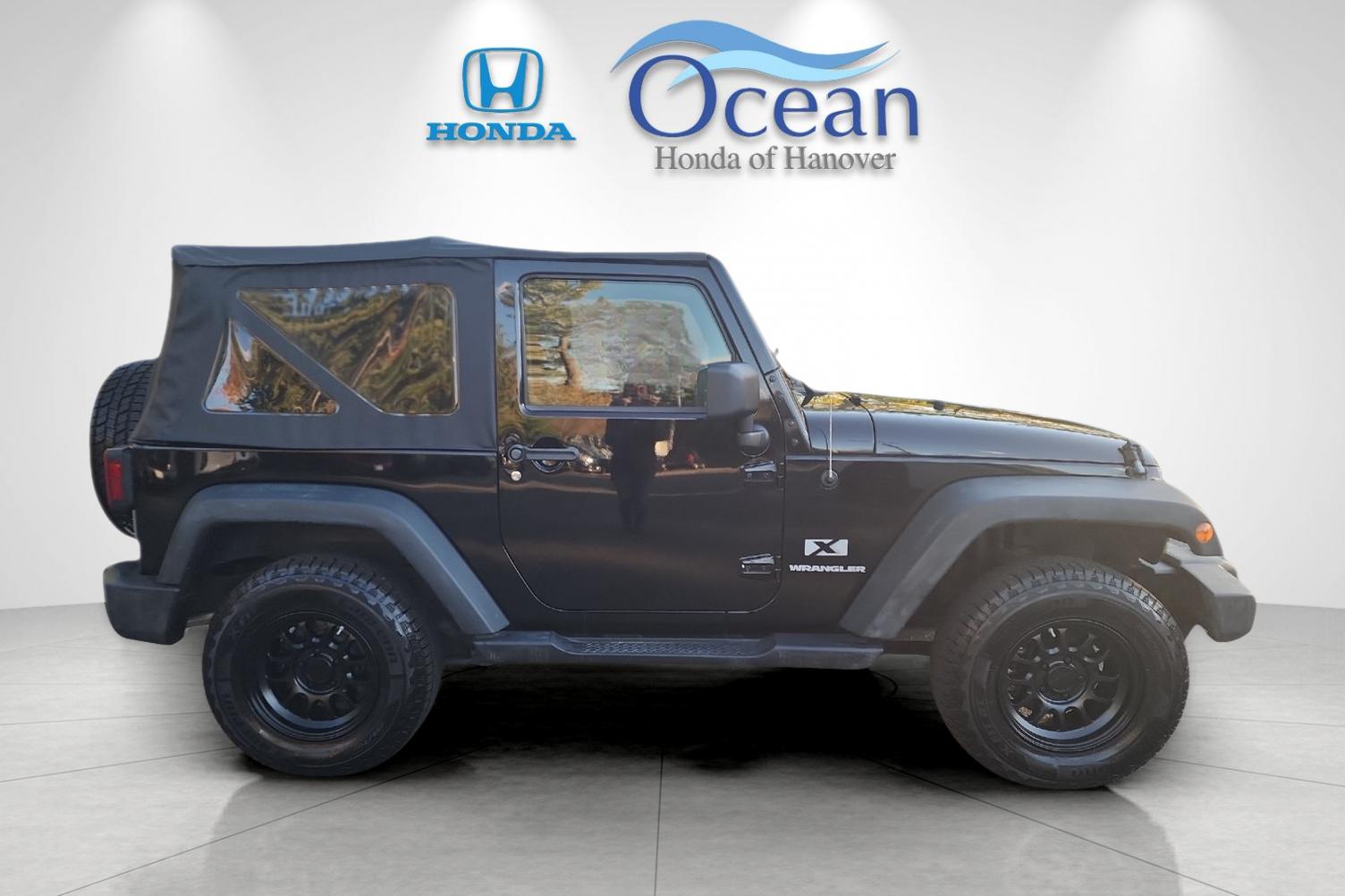 Used 2008 Black Clearcoat/Black Soft Top Jeep X image 2