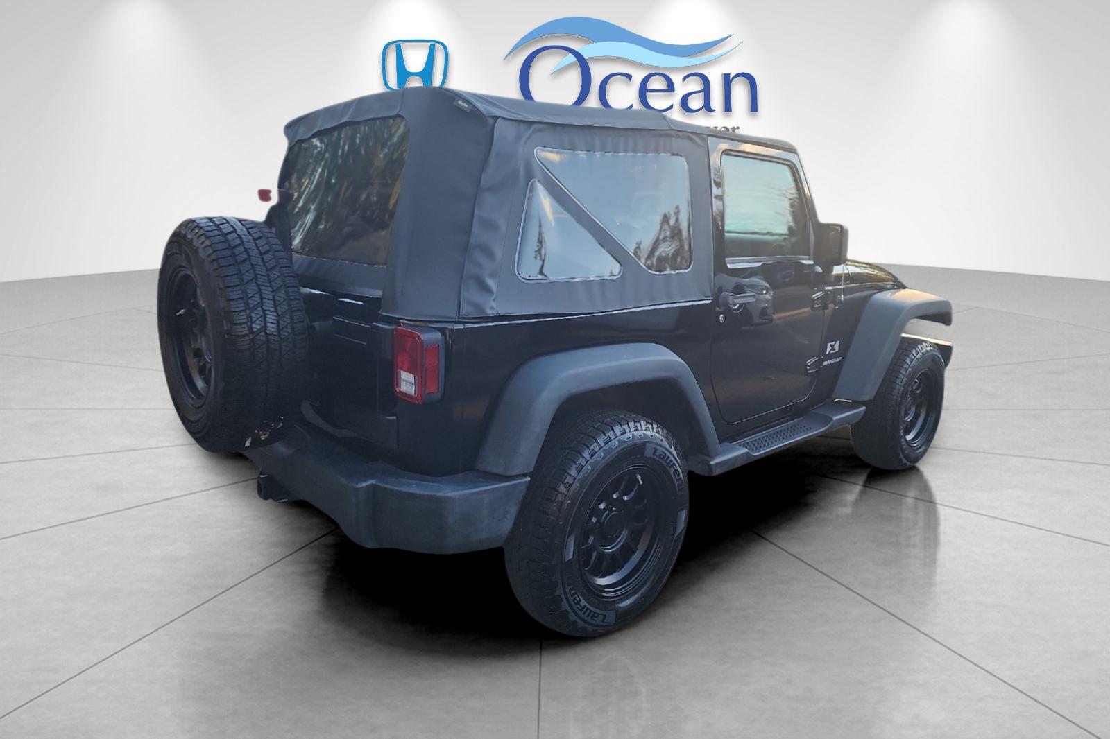 Used 2008 Black Clearcoat/Black Soft Top Jeep X image 3