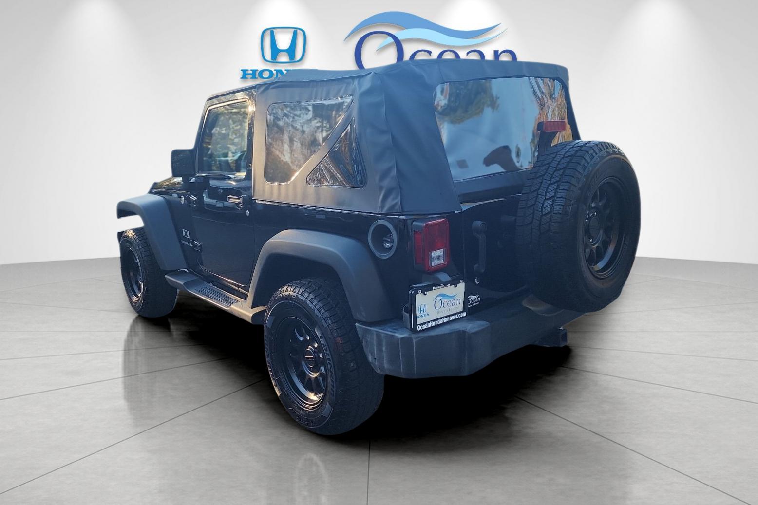 Used 2008 Black Clearcoat/Black Soft Top Jeep X image 5
