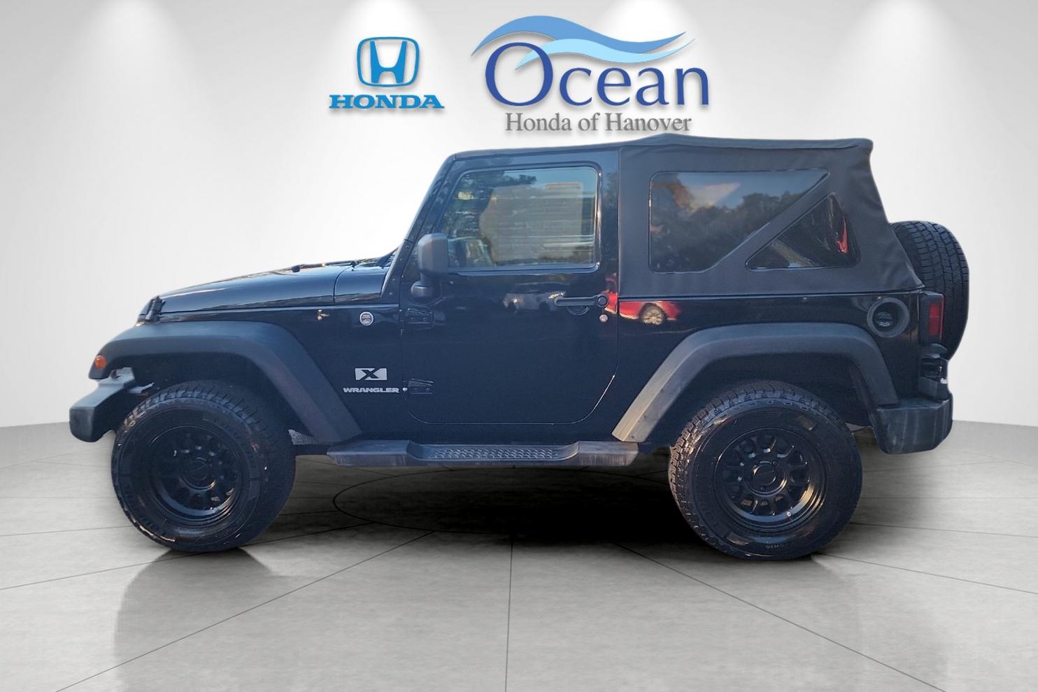 Used 2008 Black Clearcoat/Black Soft Top Jeep X image 6
