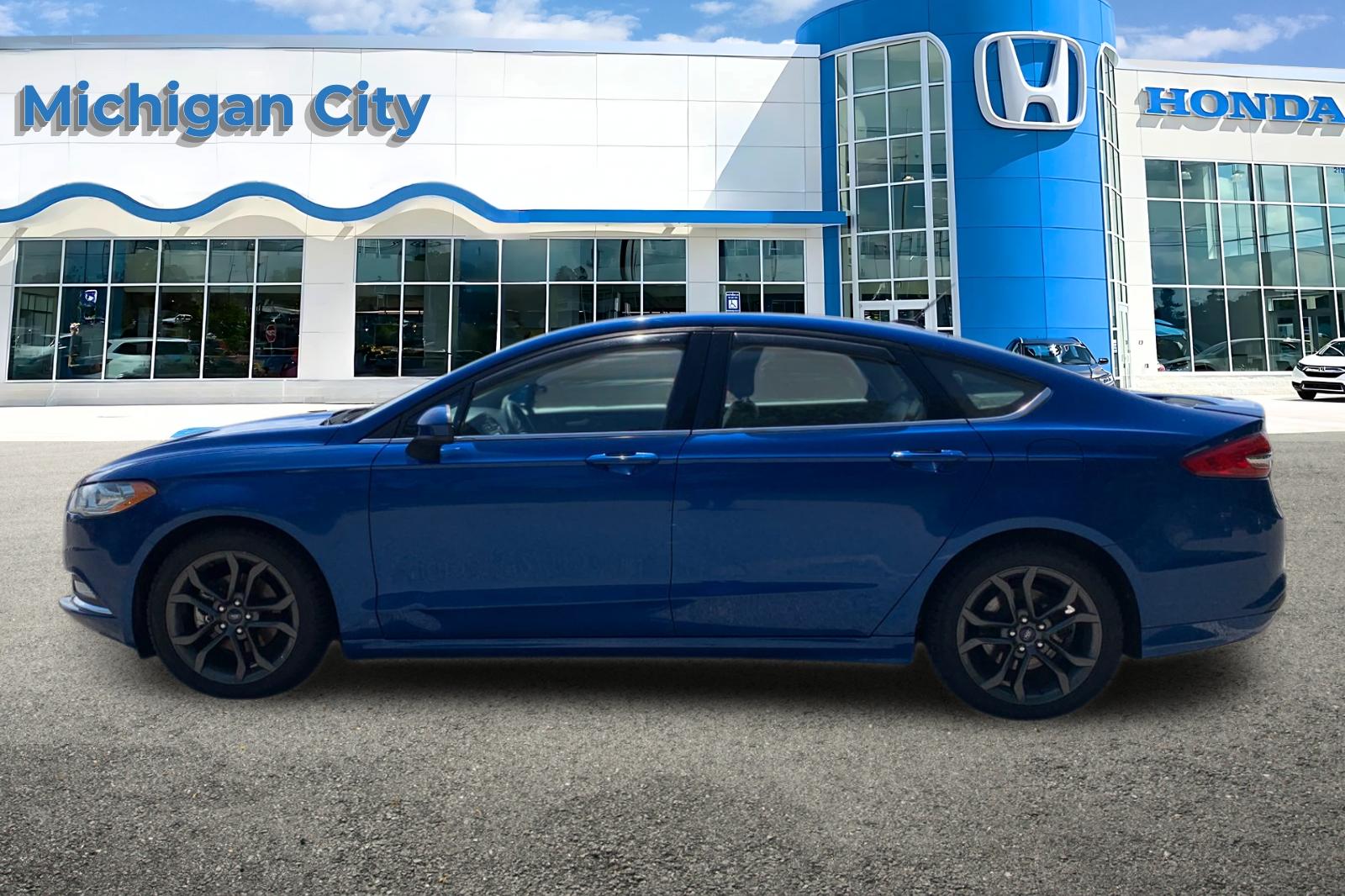 Used 2018 Lightning Blue Ford SE image 2