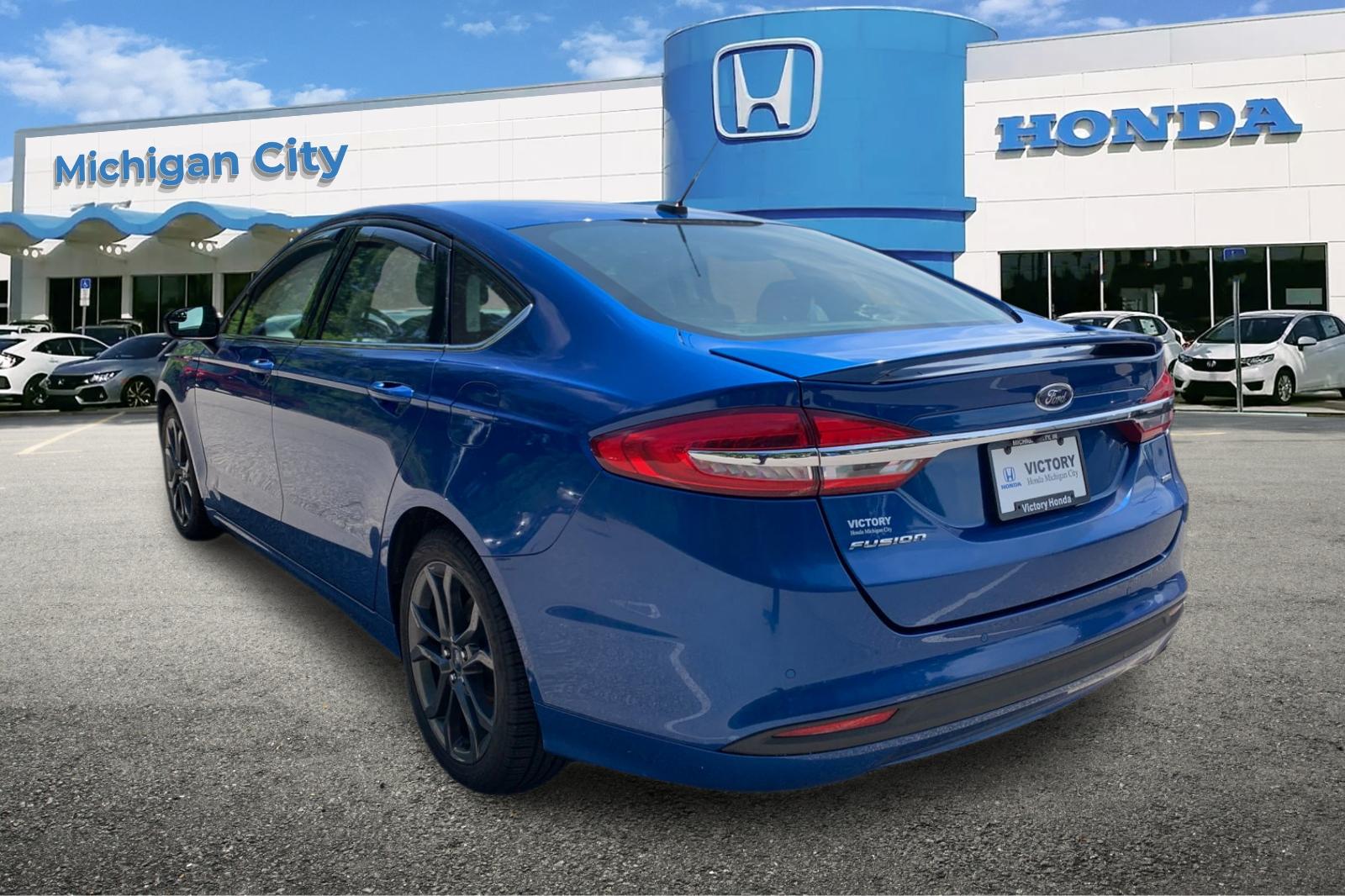 Used 2018 Lightning Blue Ford SE image 3