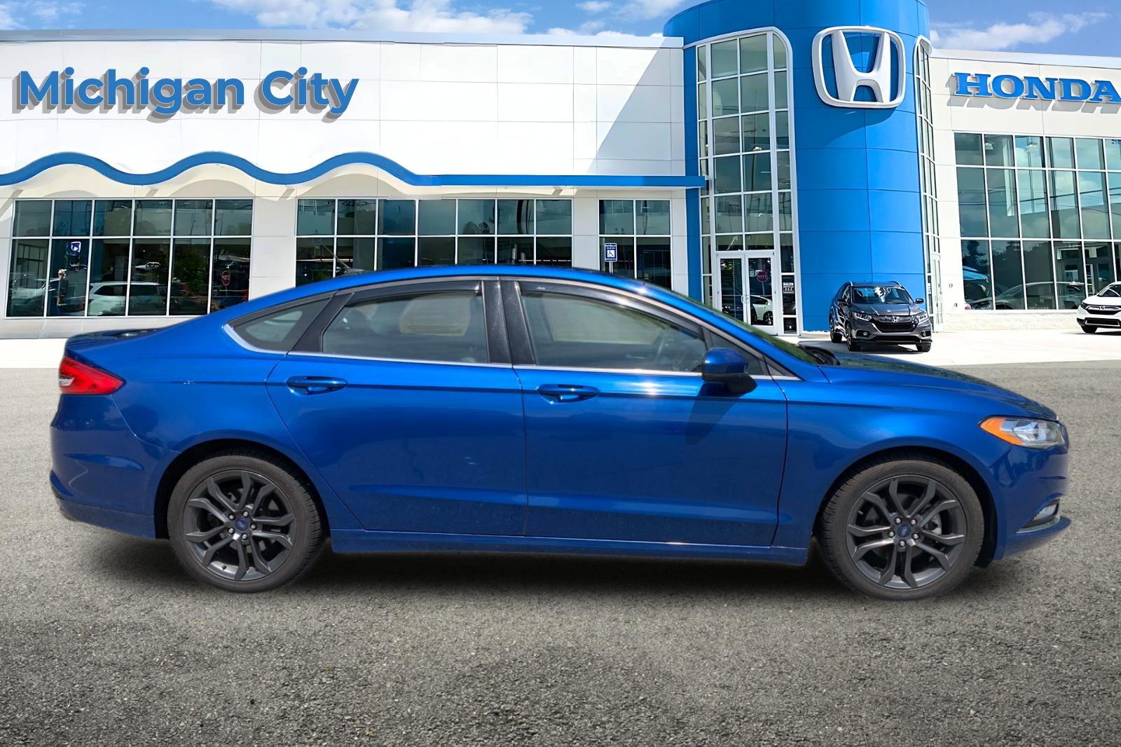 Used 2018 Lightning Blue Ford SE image 6
