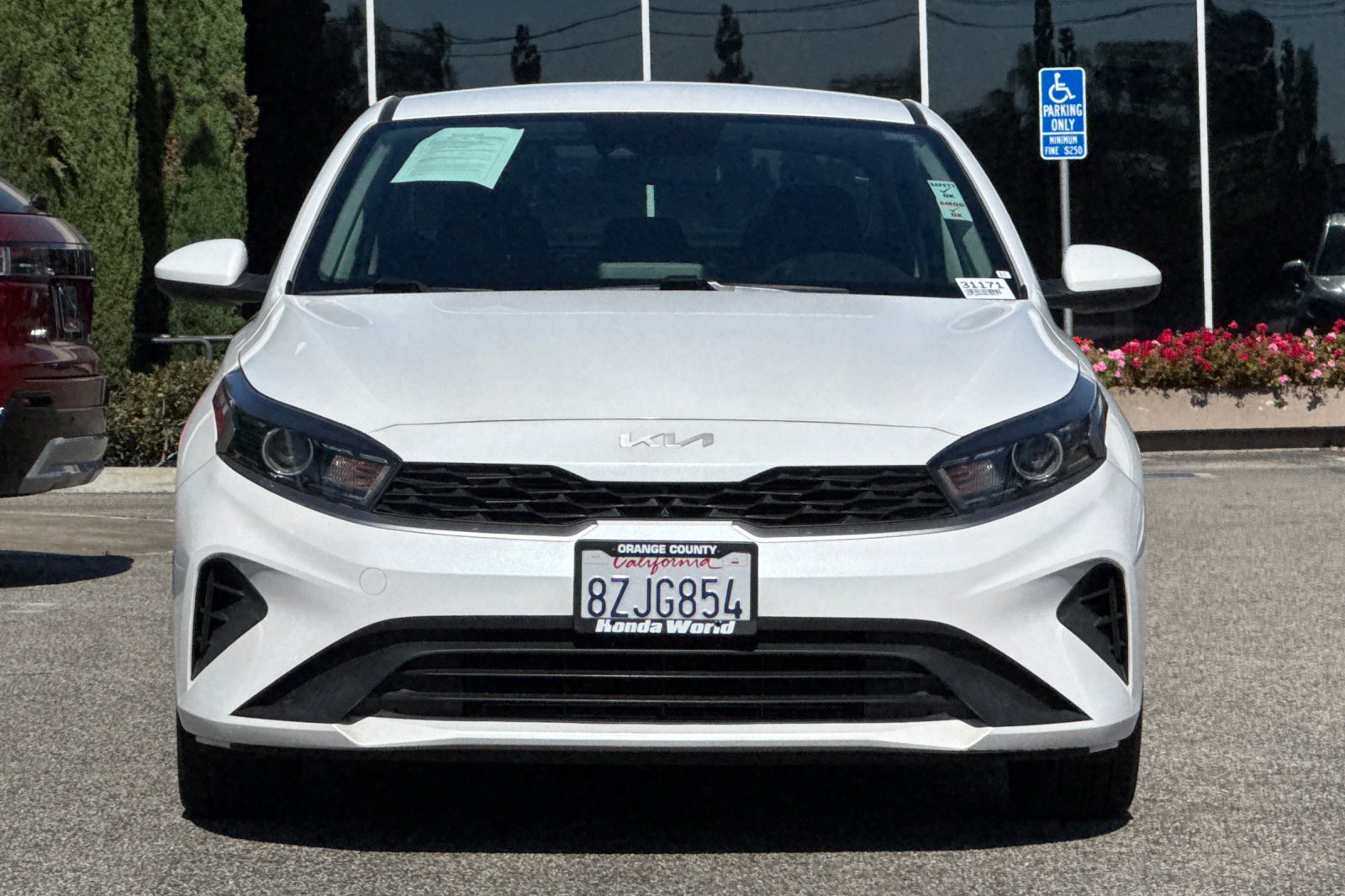Used 2022 Snow White Pearl Kia LXS image 9
