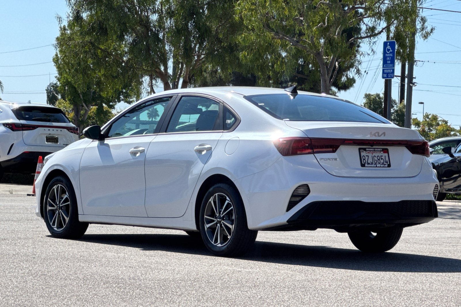 Used 2022 Snow White Pearl Kia LXS image 6