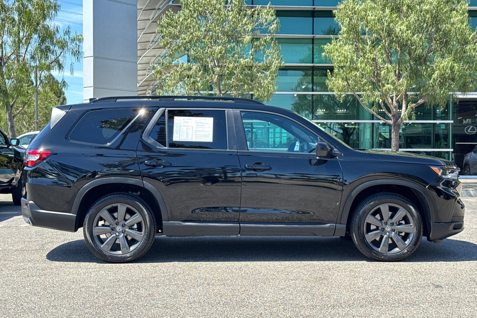 Certified Used 2025 Crystal Black Pearl Honda 2WD Sport image 3