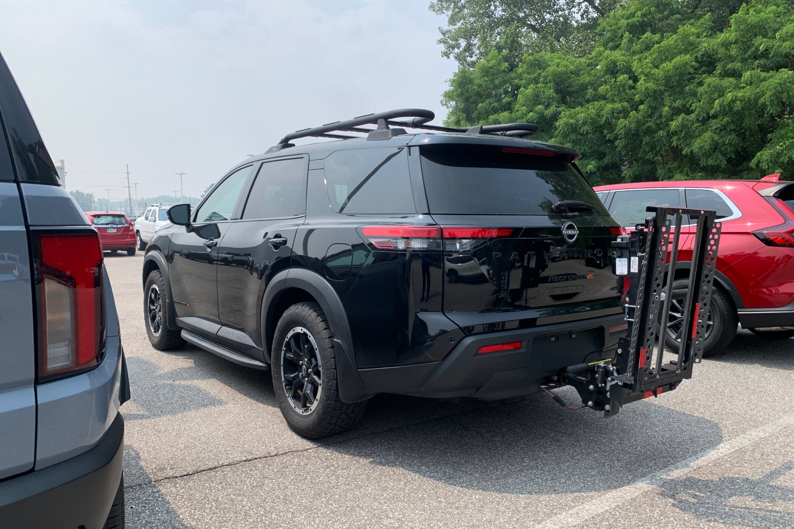 Used 2025 Super Black Nissan Rock Creek image 2
