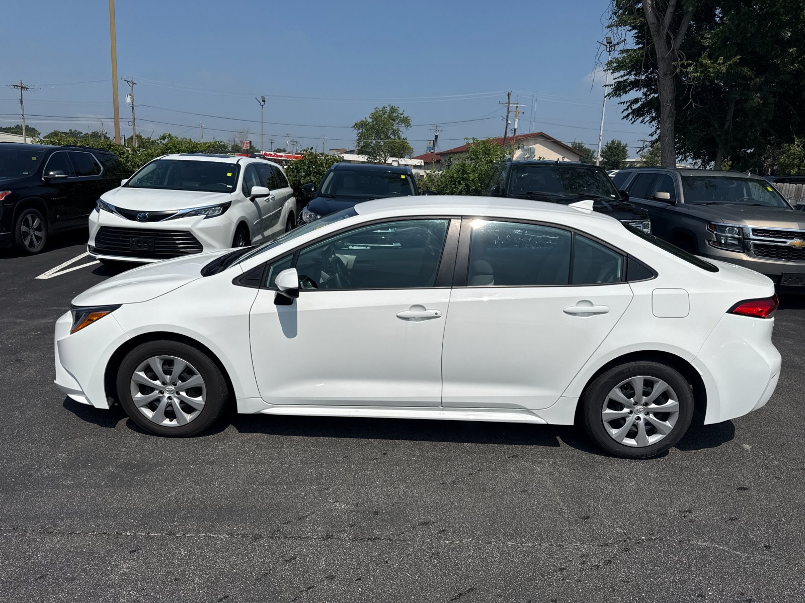 Used 2025 White Toyota LE image 3