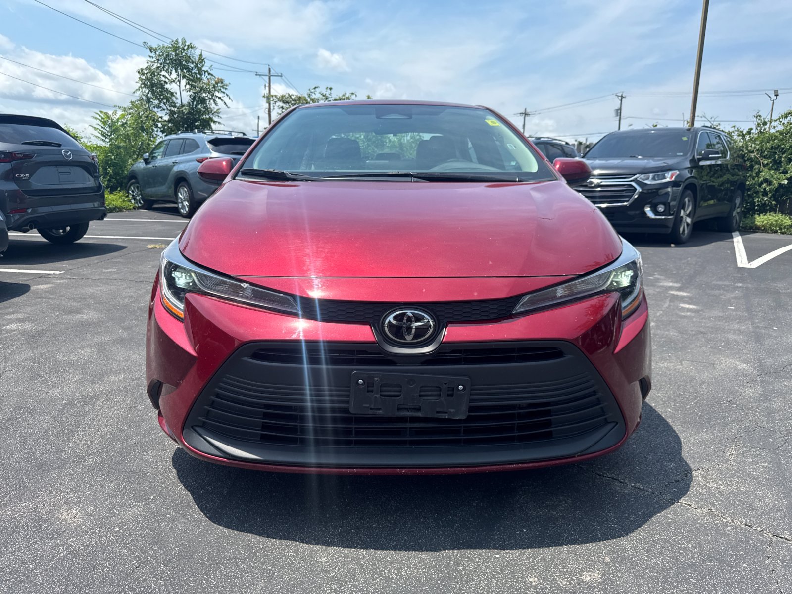 Used 2025 Red Toyota LE image 4
