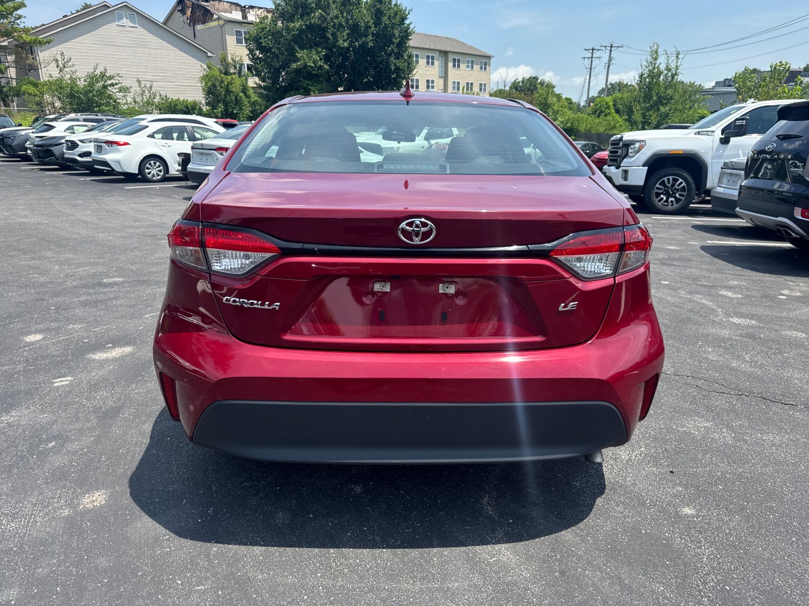 Used 2025 Red Toyota LE image 2