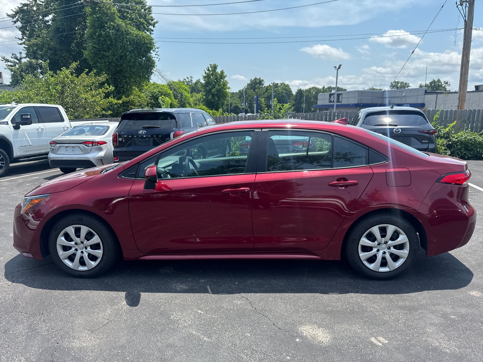 Used 2025 Red Toyota LE image 3