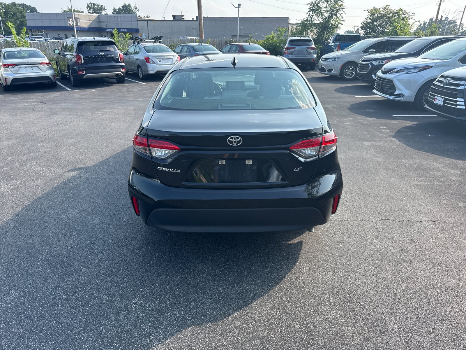 Used 2025 Black Toyota LE image 2