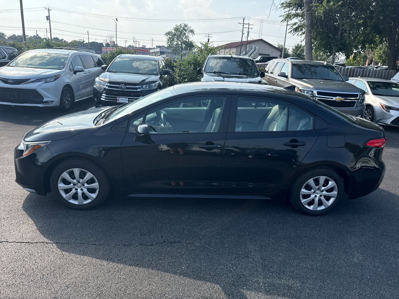 Used 2025 Black Toyota LE image 3