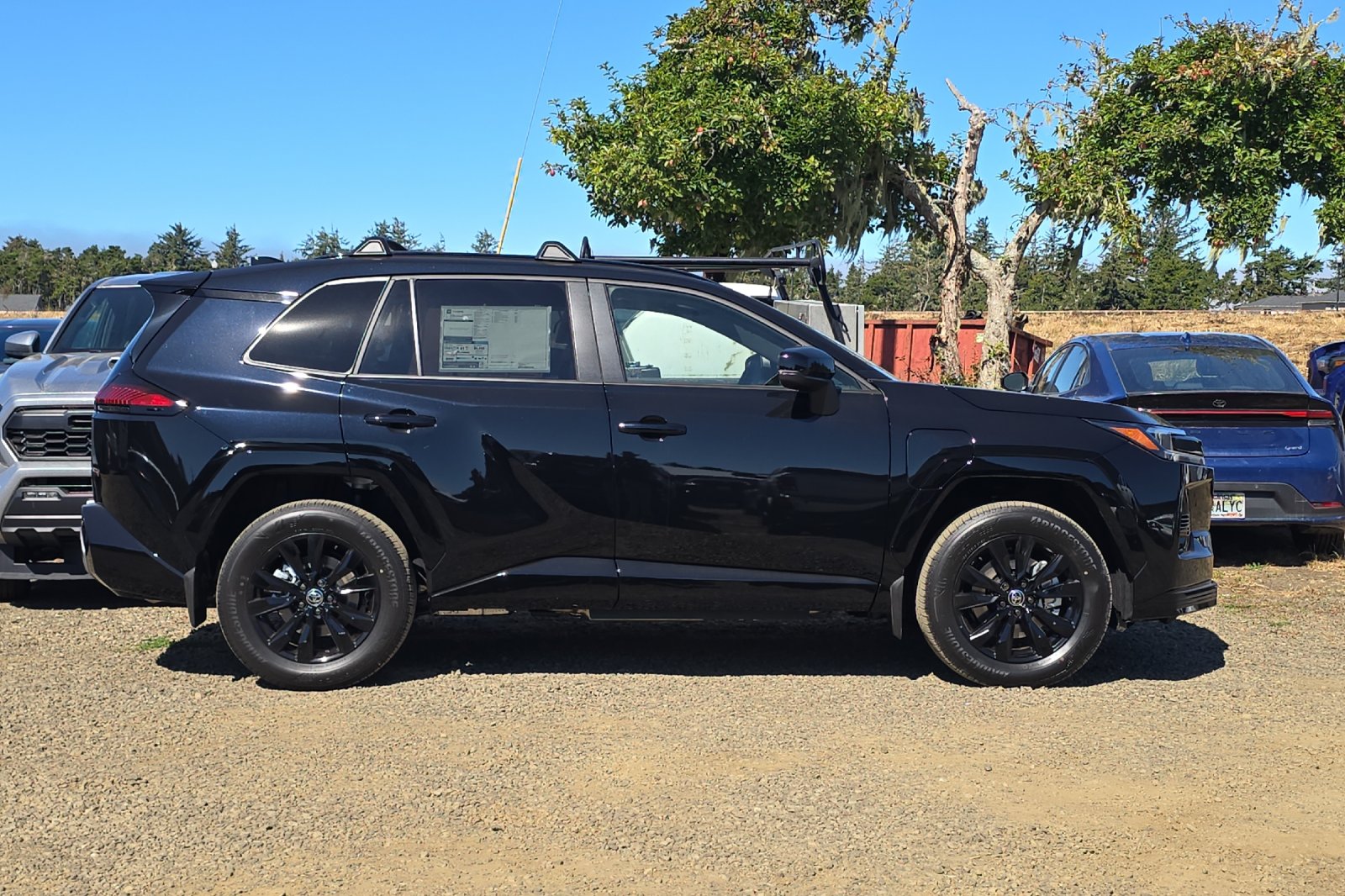 New 2026 Midnight Black Metallic Toyota  SE image 3