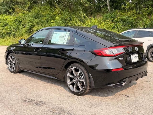 New 2026 Crystal Black Pearl Honda FWD Touring Hybrid image 3