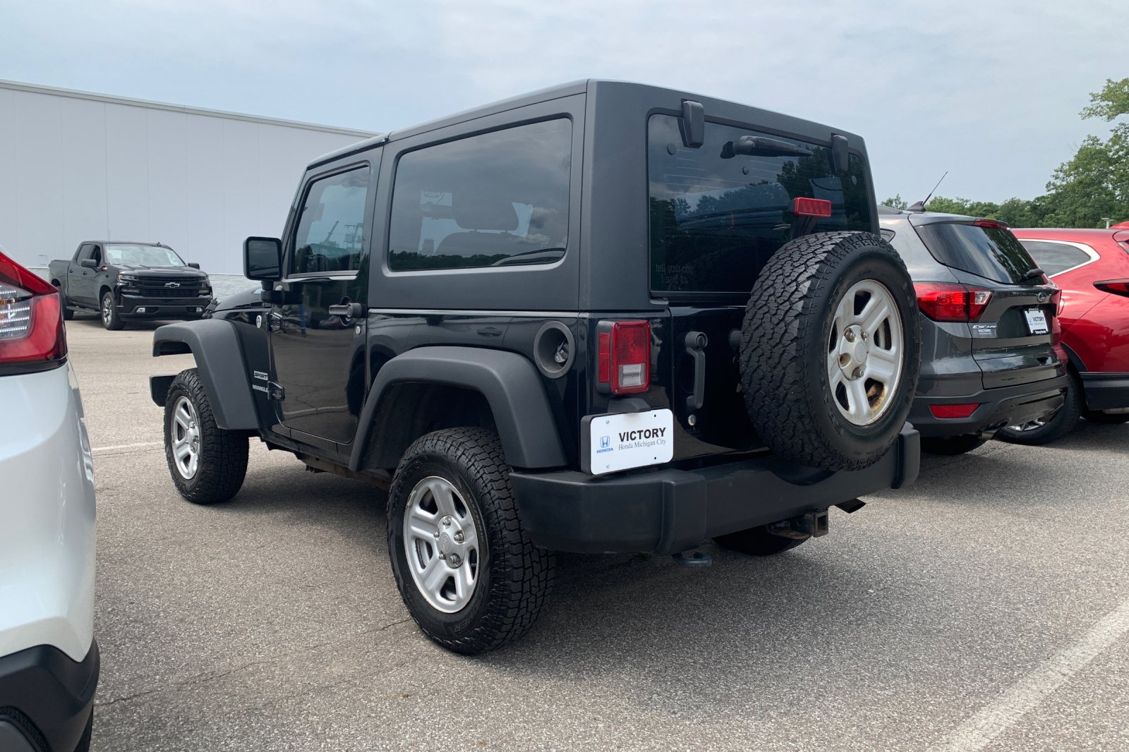 Used 2013 Black Jeep Sport image 2