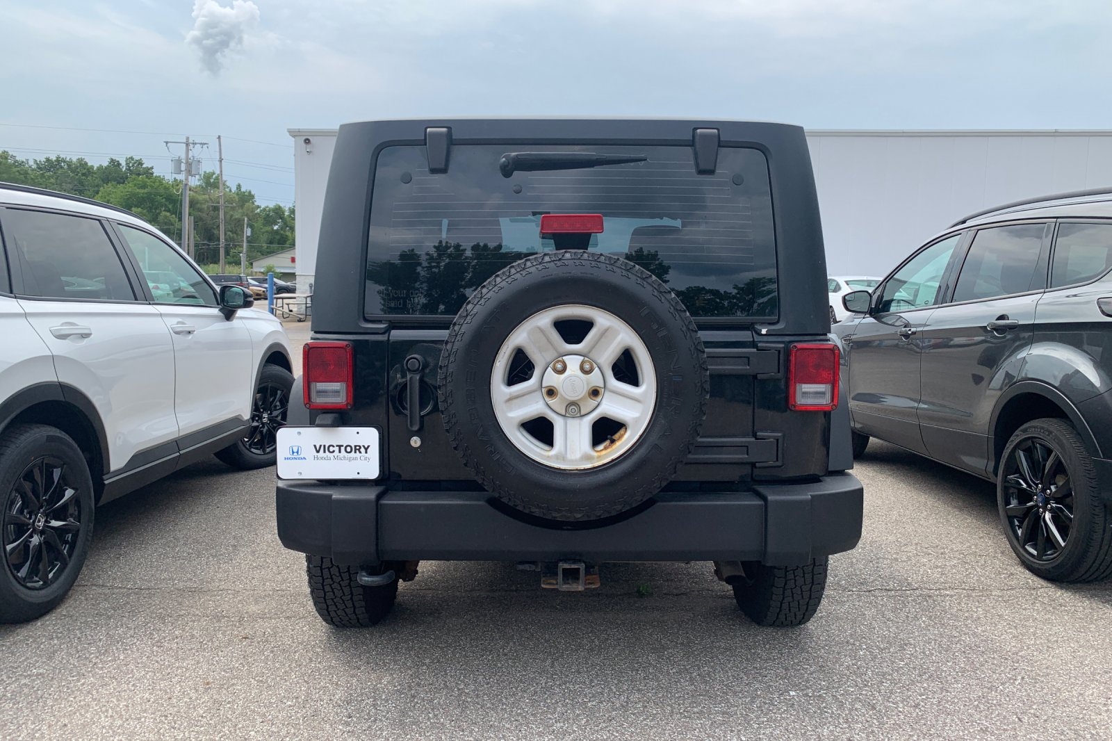 Used 2013 Black Jeep Sport image 3